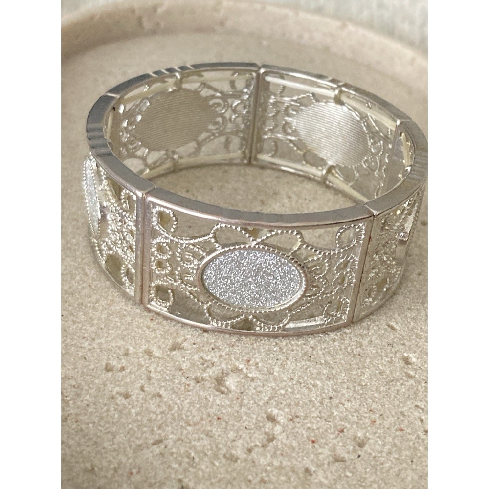 Silver Tone Filigree Stretch Bracelet Openwork Oval Textured Panel Statement